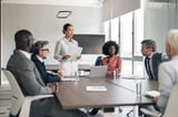 Business leader presenting during corporate meeting