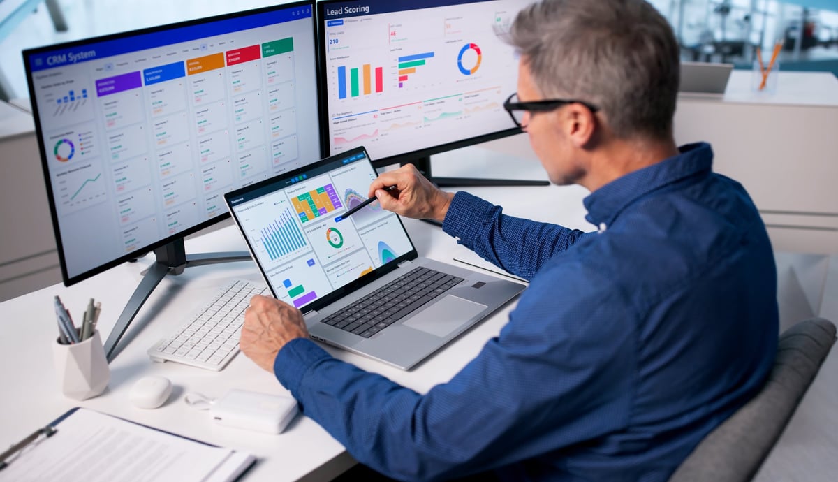 Smart Business Man Using CRM Software To Boost Company Sales.